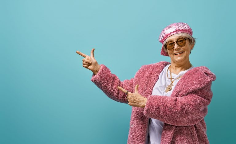 senior woman on color background